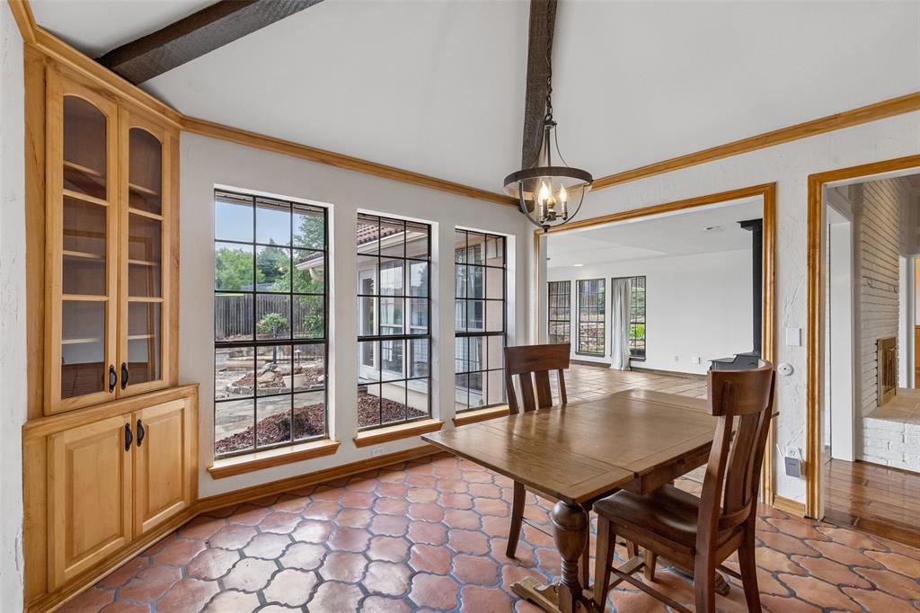 4 Eastshore Road Heath, TX 75032 - Photo 8 of 37 a view of a dining room with furniture window and wooden floor