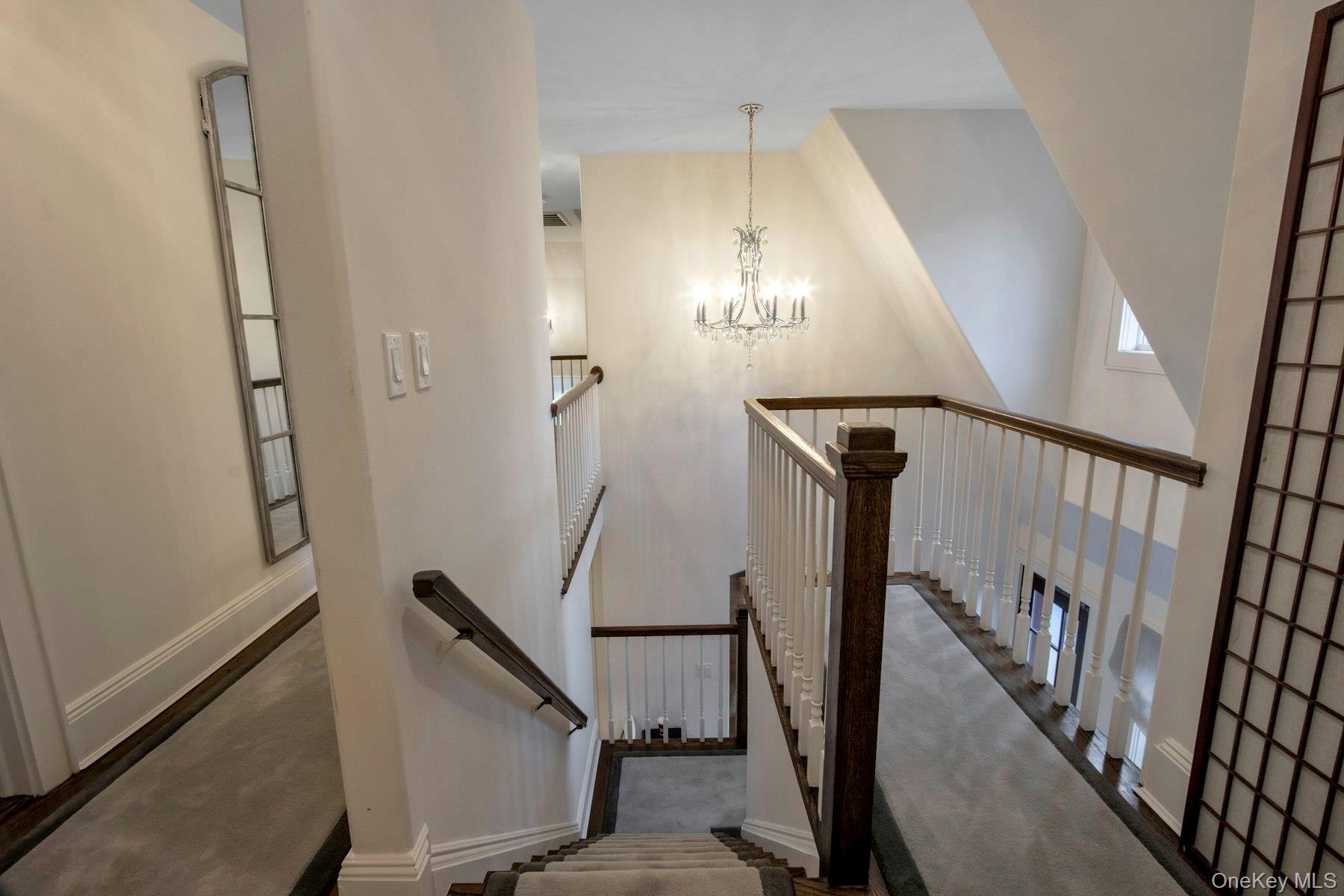 129 Washington Spring Road Palisades, NY 10964 - Photo 34 of 44 Stairway featuring a chandelier and a high ceiling
