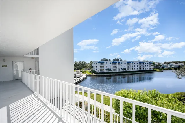a view of a lake from a balcony