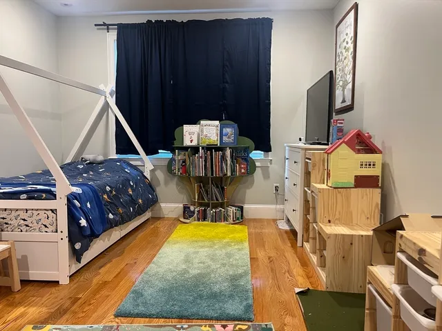 a bed room with a bed and a couch