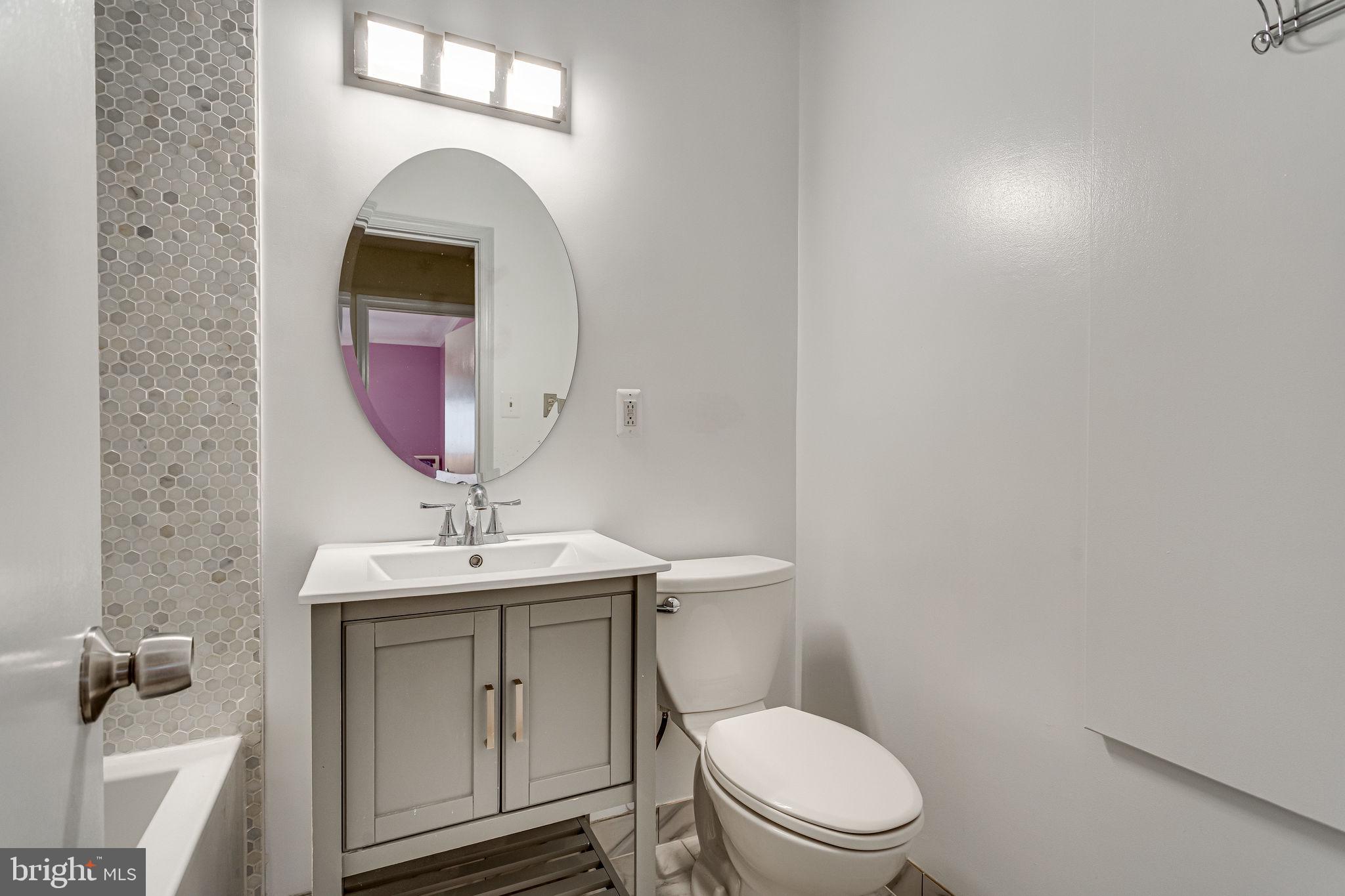 5503 Avon Court Springfield, VA 22151 - Photo 39 of 63 Renovated hallway bathroom