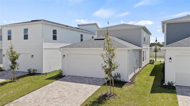 a house with trees in front of it