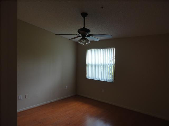 791 North Pine Island Road, Unit 214 Plantation, FL 33324 - Photo 16 of 23 a room with a window and a ceiling fan