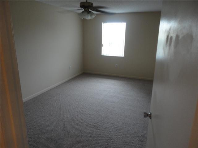 791 North Pine Island Road, Unit 214 Plantation, FL 33324 - Photo 20 of 23 an empty room with a window