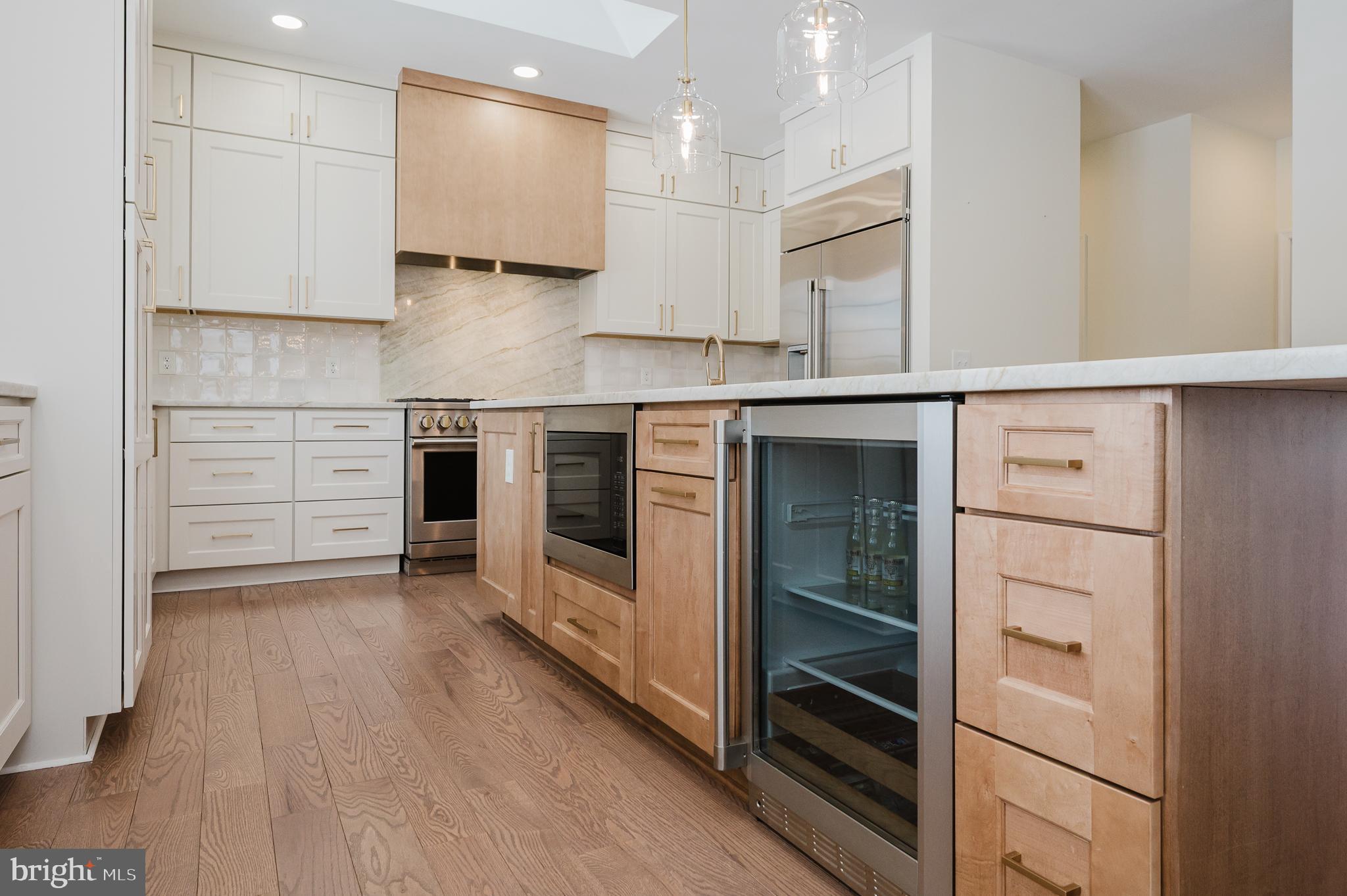 4532 Flintville Road Whiteford, MD 21160 - Photo 22 of 83 a kitchen with stainless steel appliances granite countertop a stove and a refrigerator