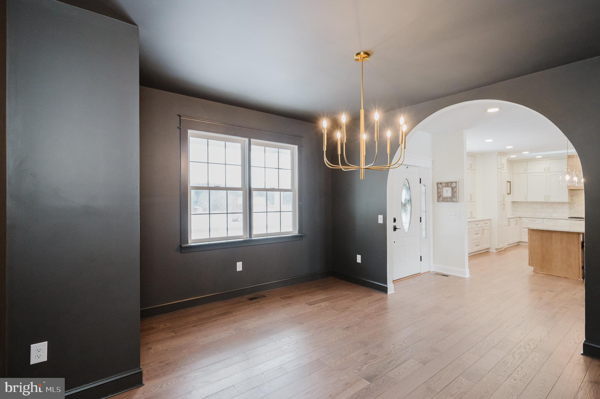 4532 Flintville Road Whiteford, MD 21160 - Photo 31 of 83 an empty room with wooden floor and windows