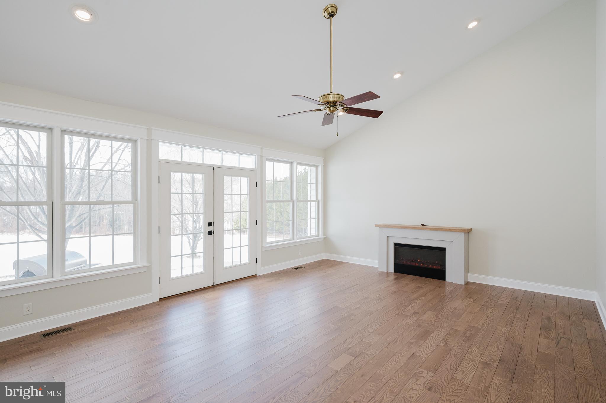 4532 Flintville Road Whiteford, MD 21160 - Photo 33 of 83 a view of empty room with wooden floor and fan