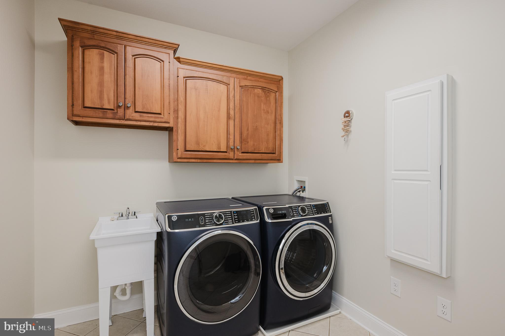 4532 Flintville Road Whiteford, MD 21160 - Photo 39 of 83 a utility room with sink dryer and washer
