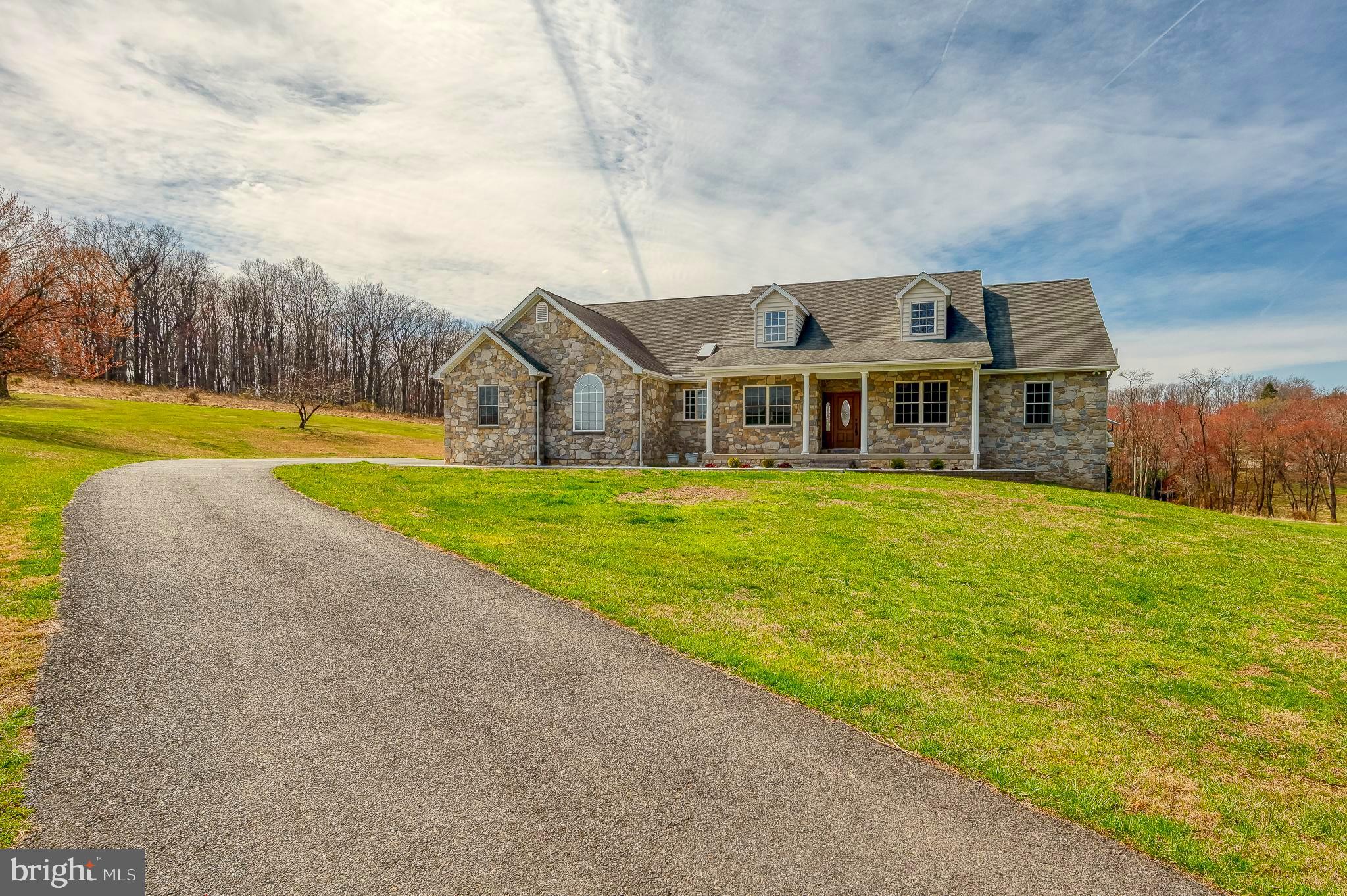 4532 Flintville Road Whiteford, MD 21160 - Photo 4 of 83 a view of a house with a big yard and large trees