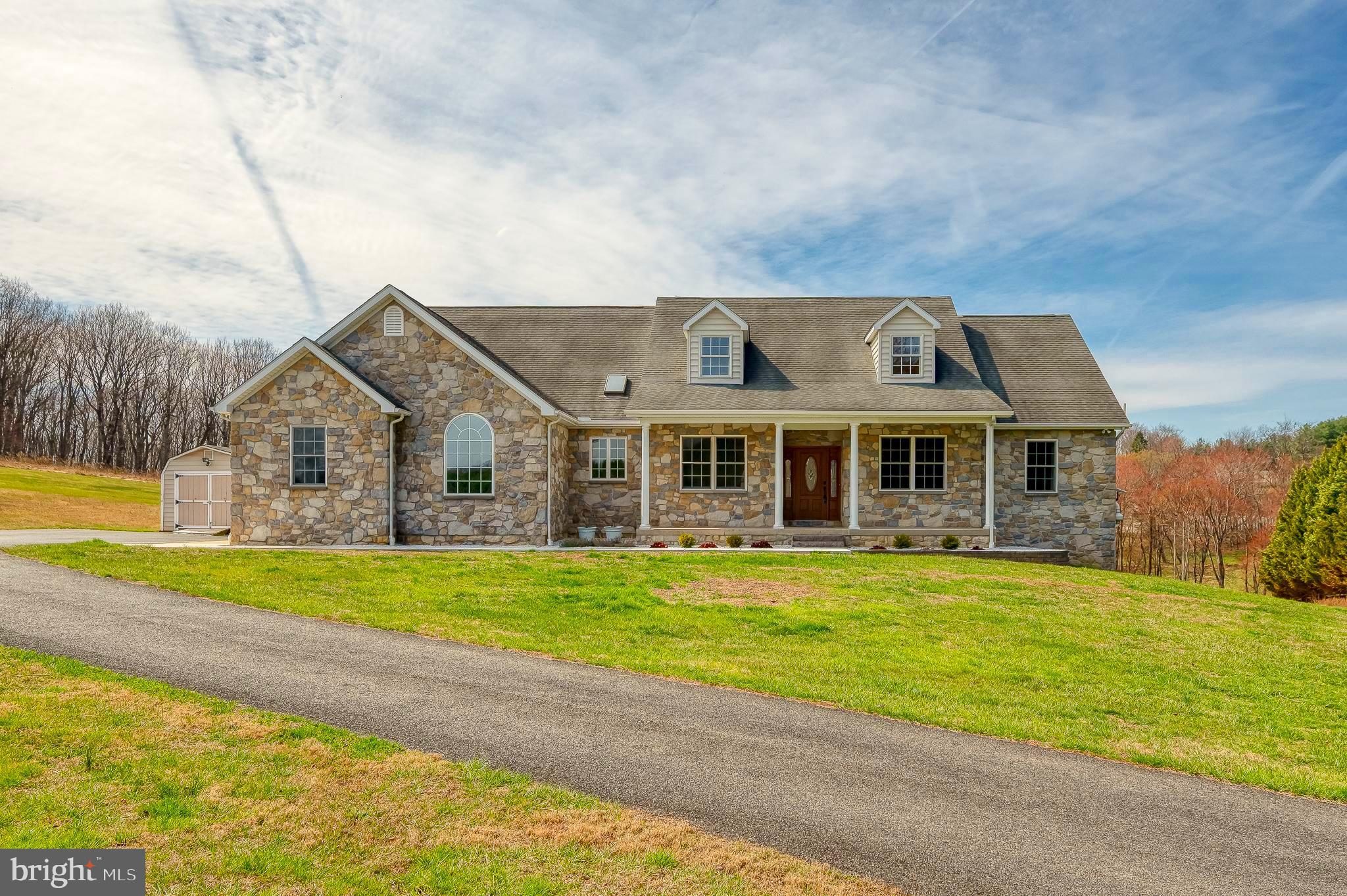 4532 Flintville Road Whiteford, MD 21160 - Photo 5 of 83 a front view of a house with a yard