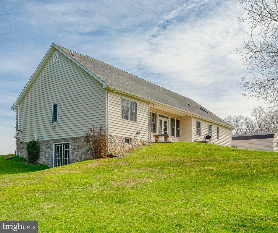4532 Flintville Road Whiteford, MD 21160 - Photo 67 of 83 a front view of house with yard and trees in the background