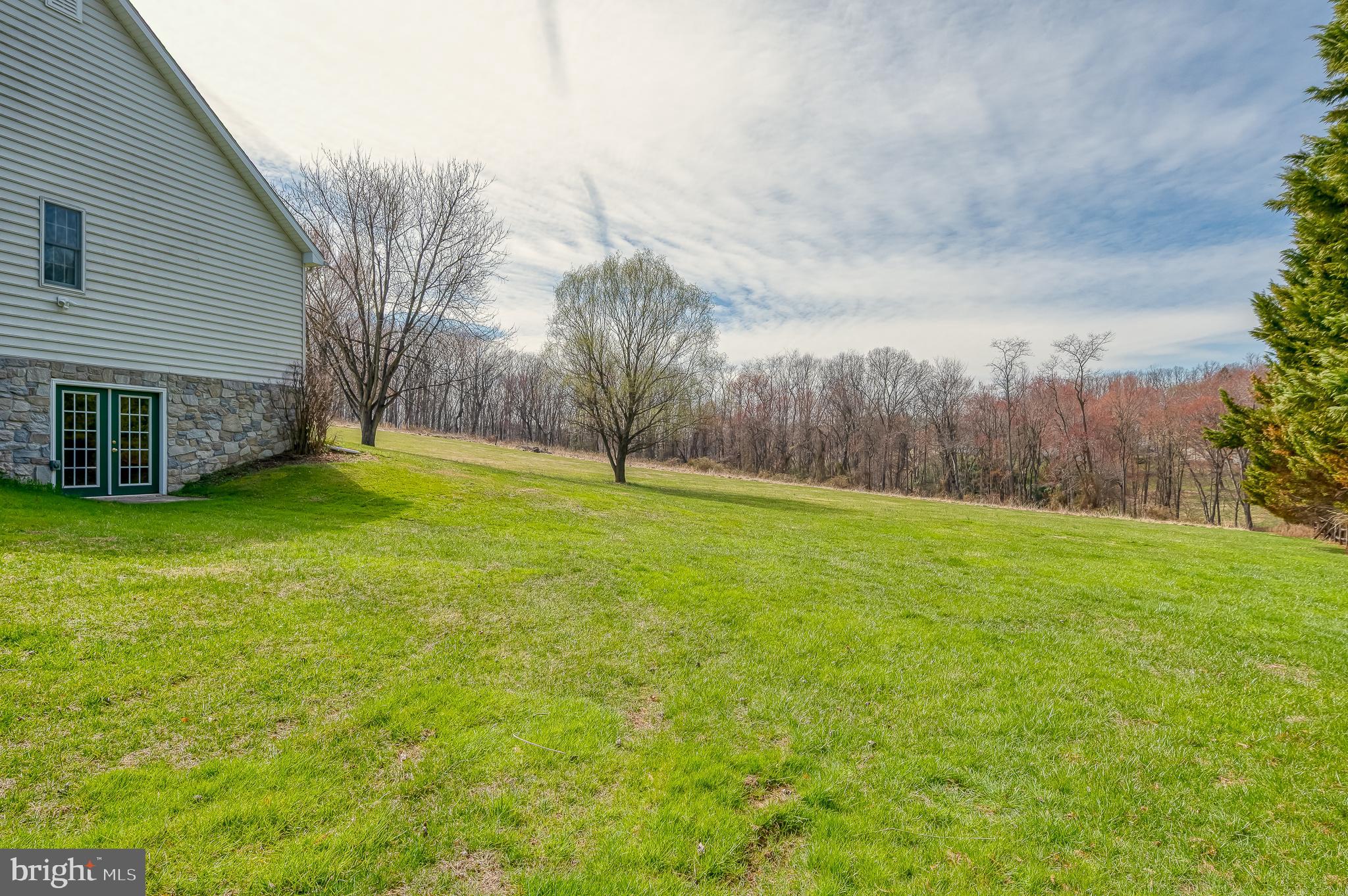 4532 Flintville Road Whiteford, MD 21160 - Photo 70 of 83 a view of a yard with a house in the background