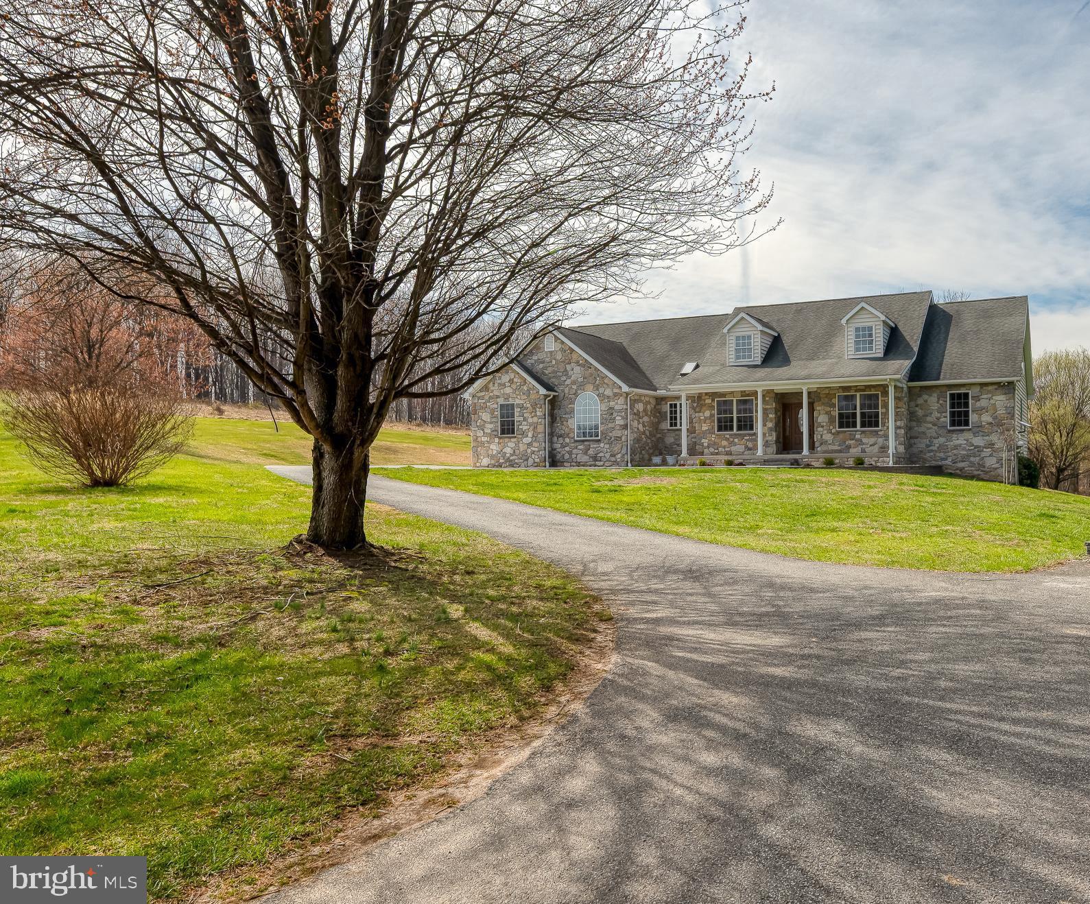 4532 Flintville Road Whiteford, MD 21160 - Photo 83 of 83 a view of a house with a big yard and large trees