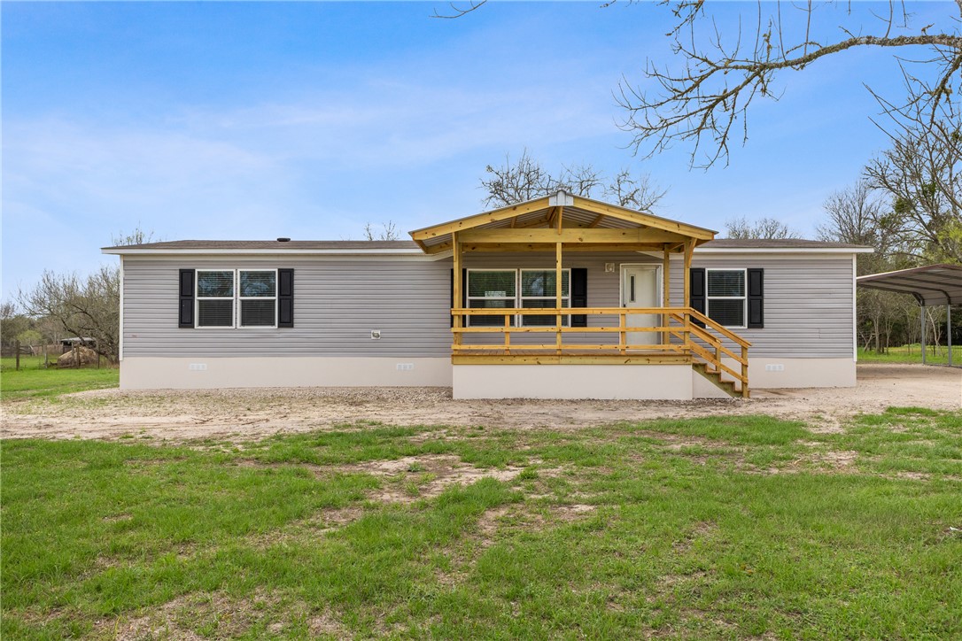 1014 Doe Run Road Caldwell, TX 77836 - Photo 4 of 23 a front view of a house with garden