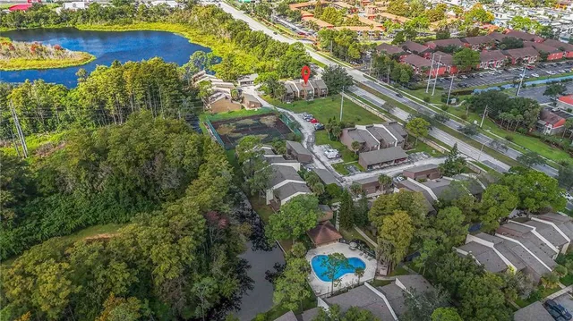 a house with trees in the background