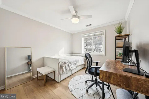 a view of a livingroom with furniture and a window
