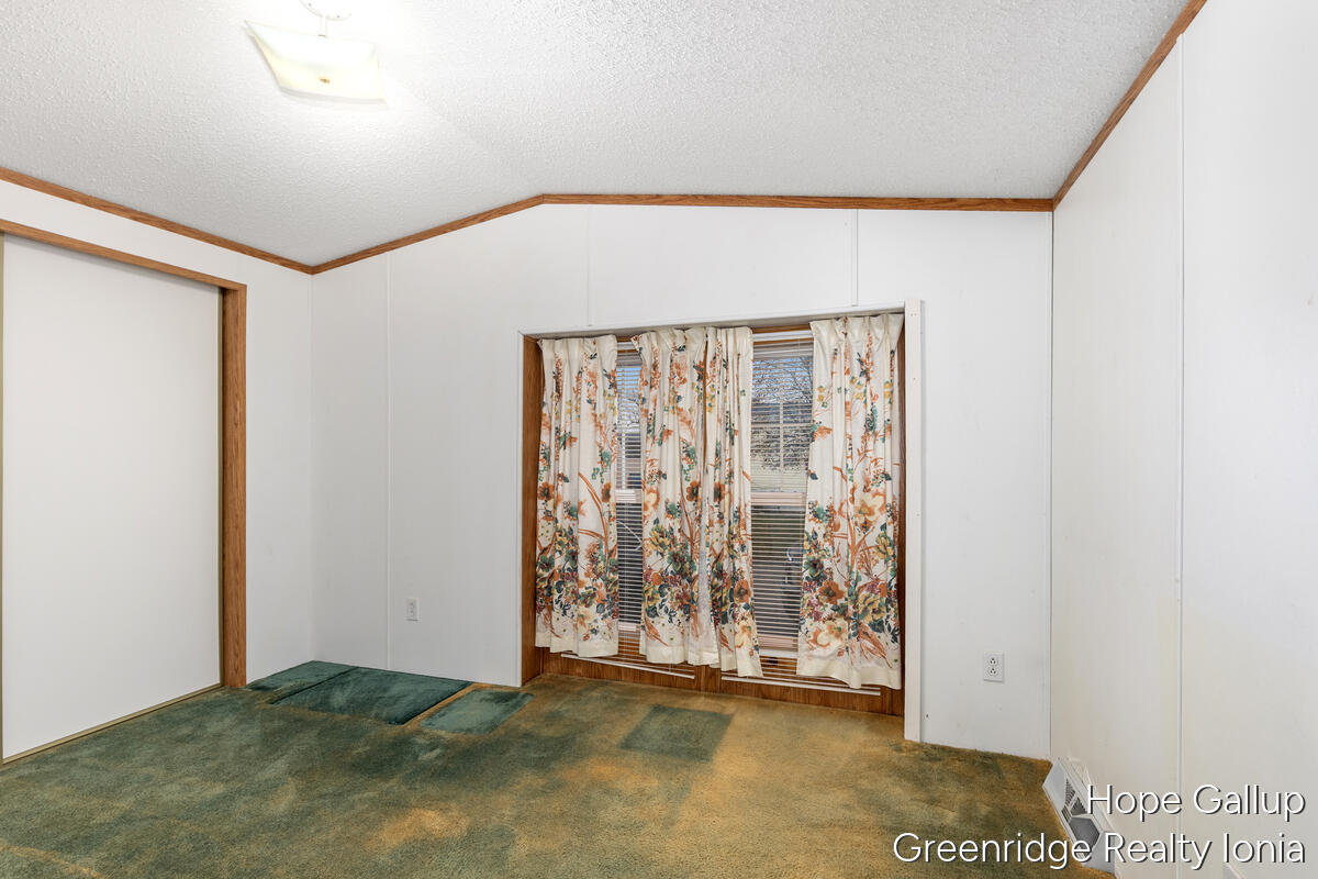 360 East Tuttle Road, Unit 183 Ionia, MI 48846 - Photo 15 of 16 SECOND BEDROOM