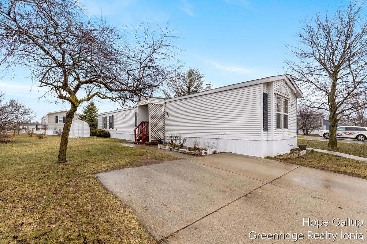 360 East Tuttle Road, Unit 183 Ionia, MI 48846 - Photo 2 of 16 SIDE VIEW WITH DRIVE
