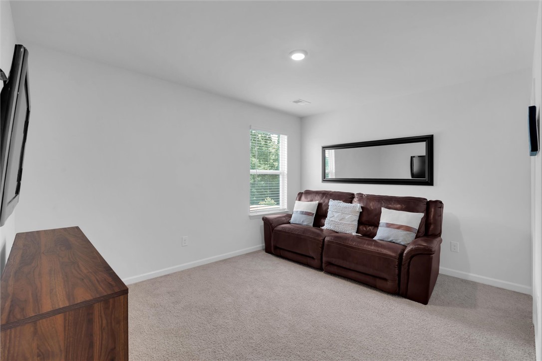 34 Karkinnen Court Pendleton, SC 29670 - Photo 17 of 36 A cozy, sun-filled retreat offering comfort and quiet, perfect for relaxation or a home office.