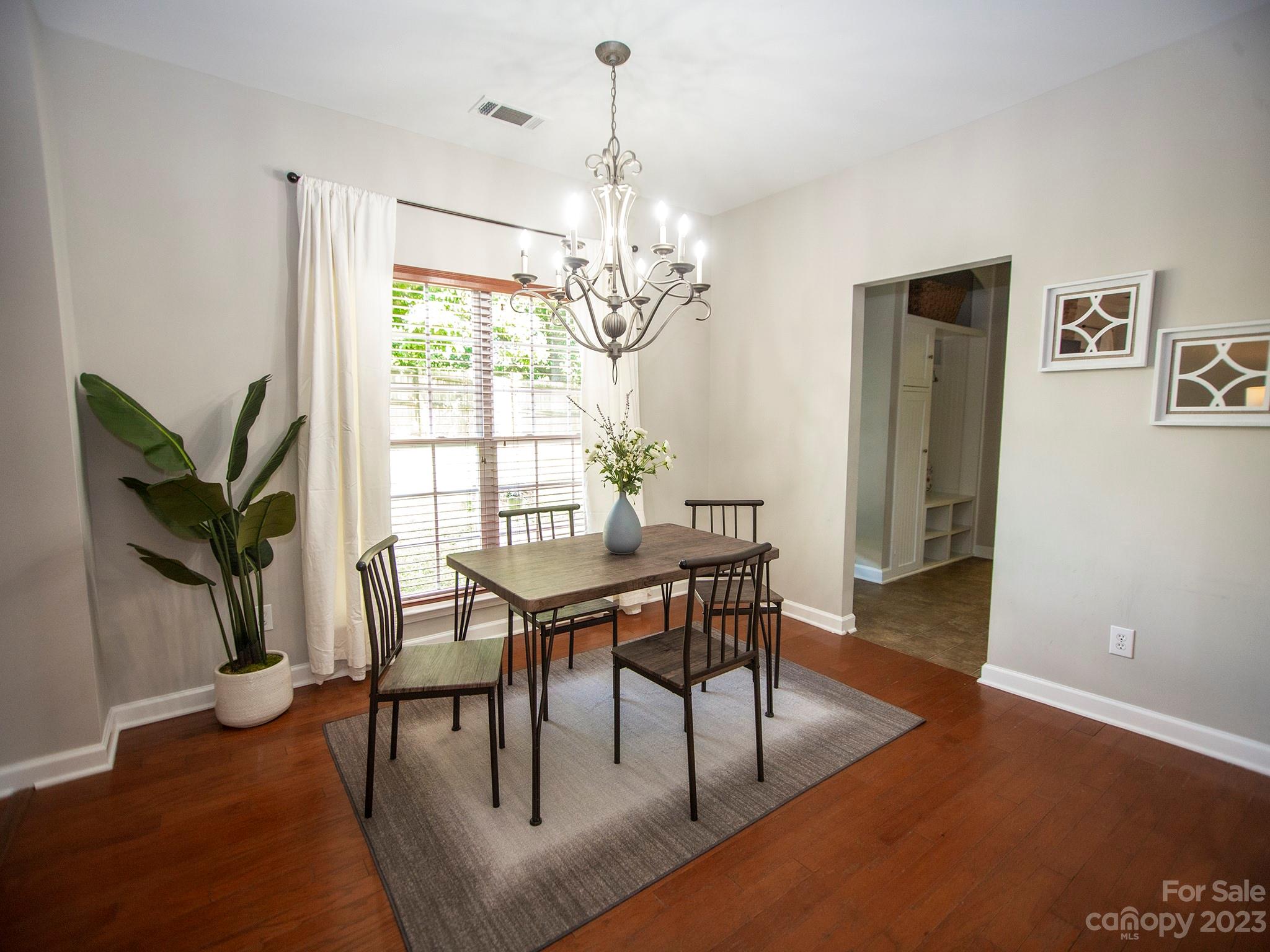 3437 Norwich Road Fort Mill, SC 29715 - Photo 13 of 46 a view of a dining room with furniture window and wooden floor
