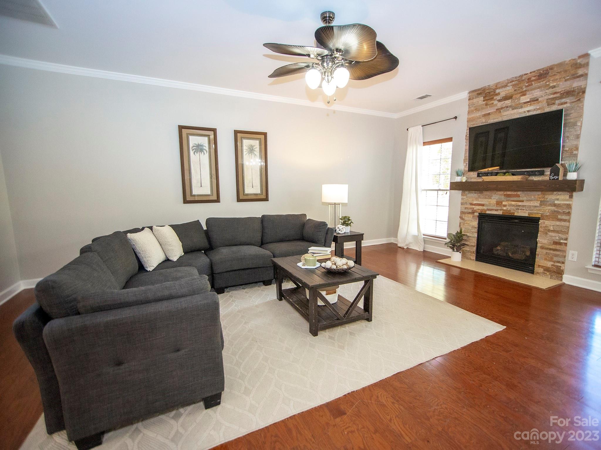 3437 Norwich Road Fort Mill, SC 29715 - Photo 17 of 46 a living room with furniture fireplace and flat screen tv