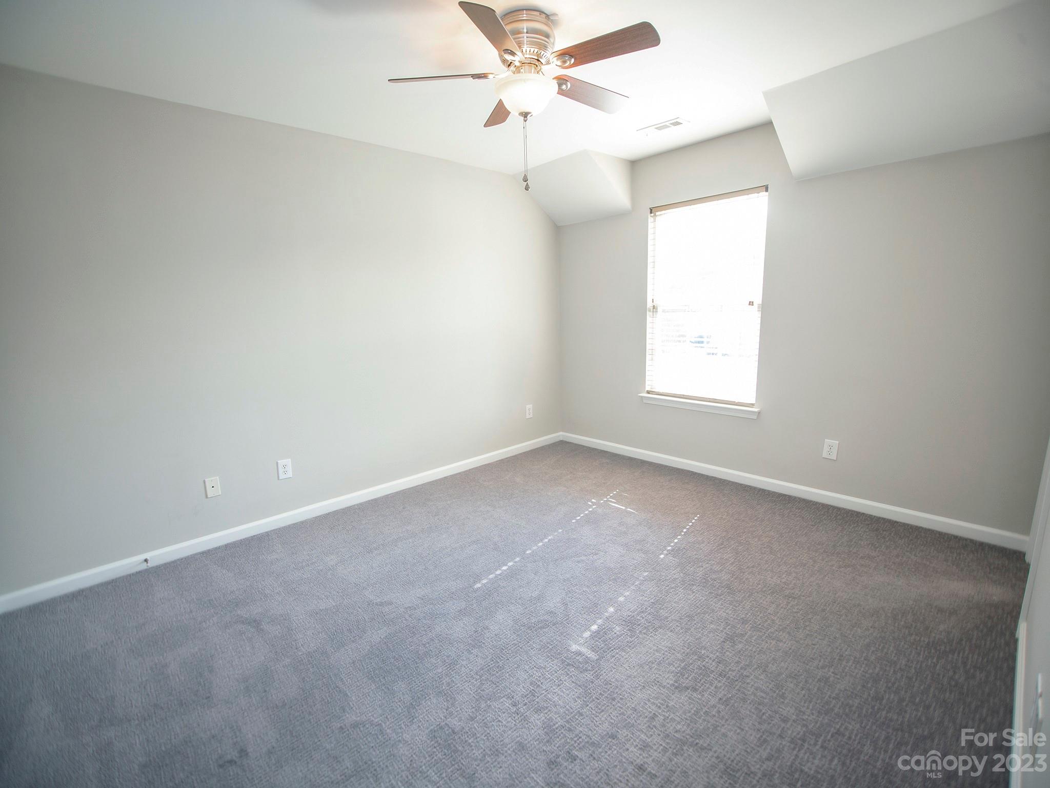 3437 Norwich Road Fort Mill, SC 29715 - Photo 25 of 46 an empty room with a window and a fan