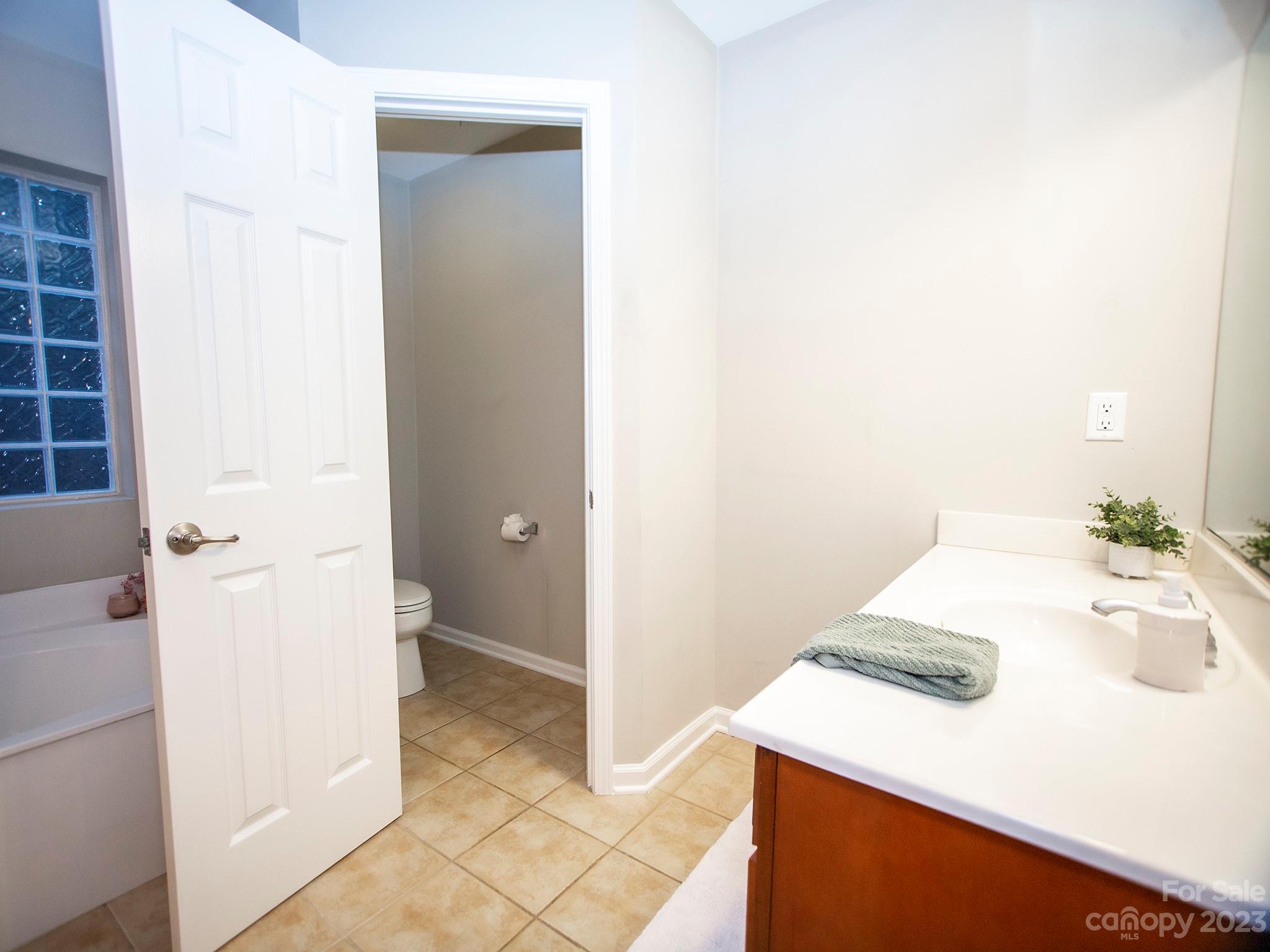 3437 Norwich Road Fort Mill, SC 29715 - Photo 38 of 46 a bathroom with a sink and a mirror