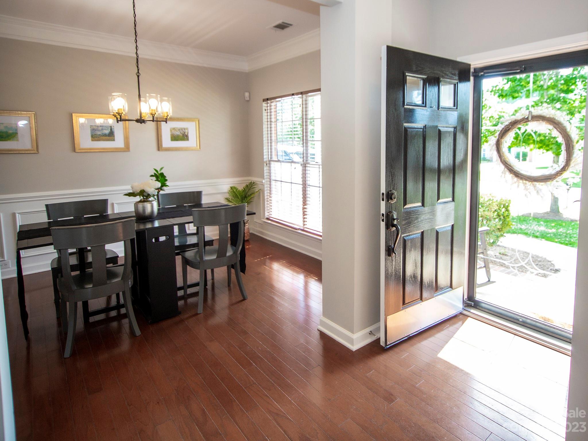 3437 Norwich Road Fort Mill, SC 29715 - Photo 5 of 46 a view of a dining room with furniture window and wooden floor