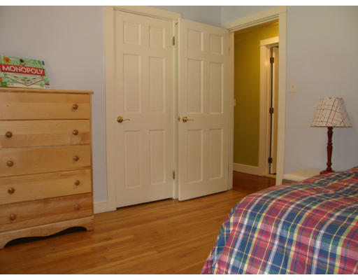 19 Oxbow Road Lexington, MA 02421 - Photo 13 of 23 a bedroom with a bed and a cabinets
