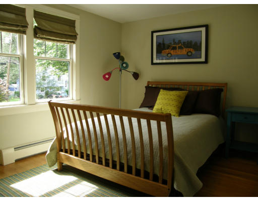 19 Oxbow Road Lexington, MA 02421 - Photo 14 of 23 a bed sitting in a bedroom next to a window