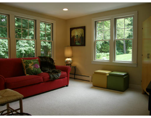 19 Oxbow Road Lexington, MA 02421 - Photo 3 of 23 a living room with furniture and a window
