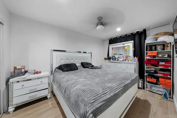 a bedroom with a bed and furniture