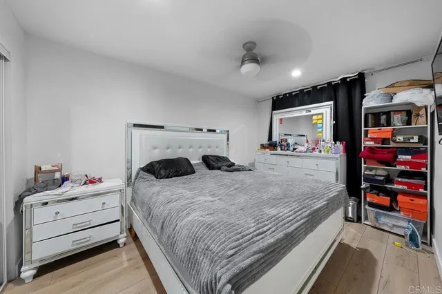 a bedroom with a bed and furniture