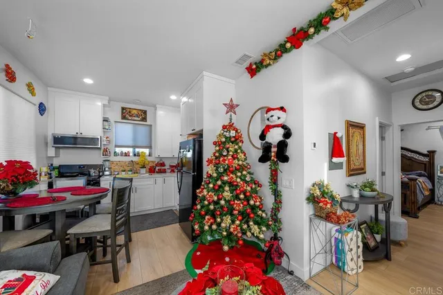 a view of a dining room with furniture and toys