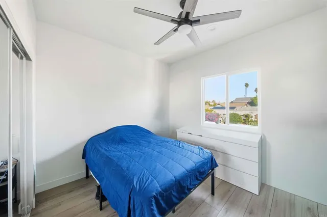 a kitchen with stainless steel appliances granite countertop a refrigerator a stove top oven a sink and dishwasher