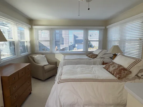 a living room with furniture and windows