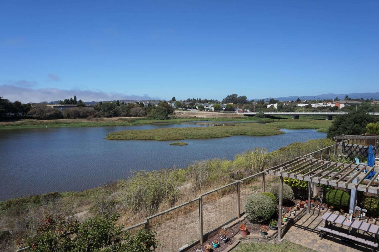 45 Pelican Drive Watsonville, CA 95076 - Photo 12 of 21 a view of a lake with a outdoor space
