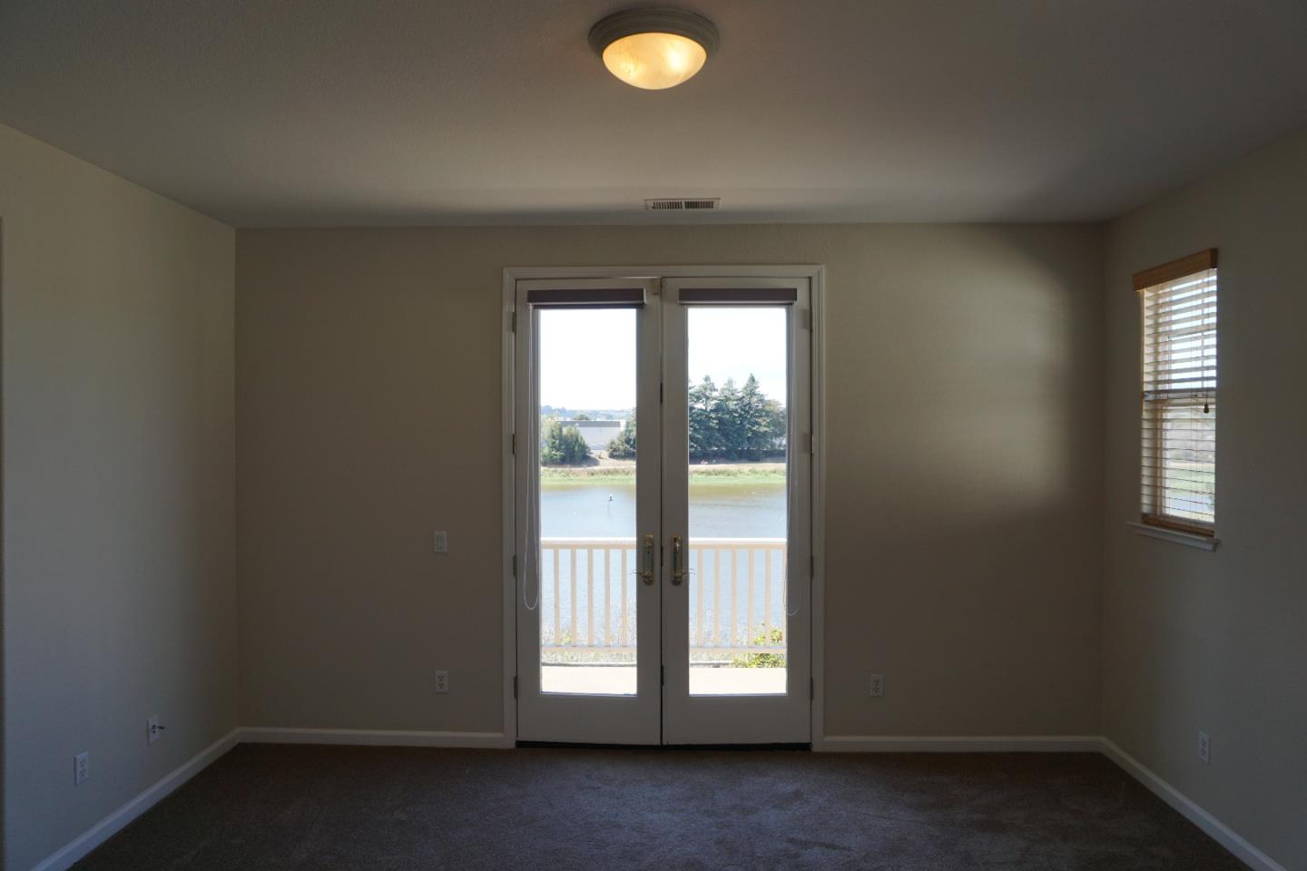 45 Pelican Drive Watsonville, CA 95076 - Photo 13 of 21 an empty room with windows