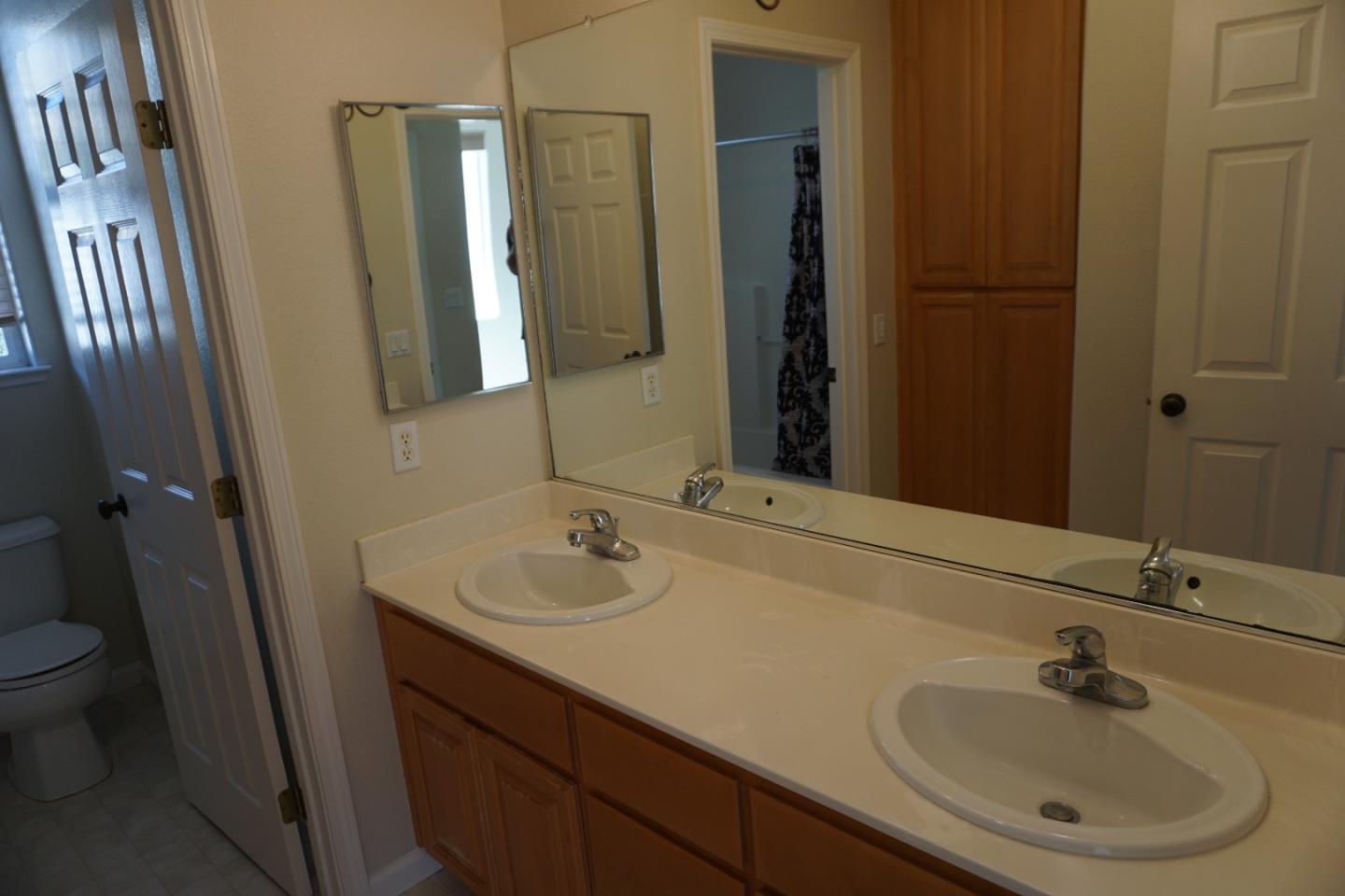 45 Pelican Drive Watsonville, CA 95076 - Photo 19 of 21 a bathroom with a sink and a mirror
