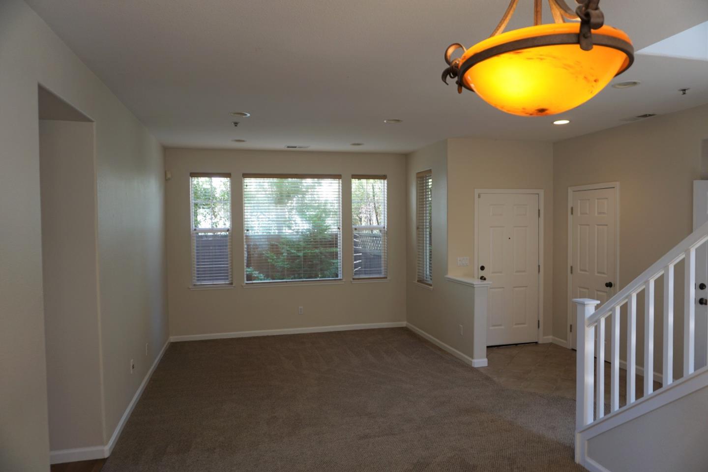 45 Pelican Drive Watsonville, CA 95076 - Photo 4 of 21 an empty room with windows and mirror