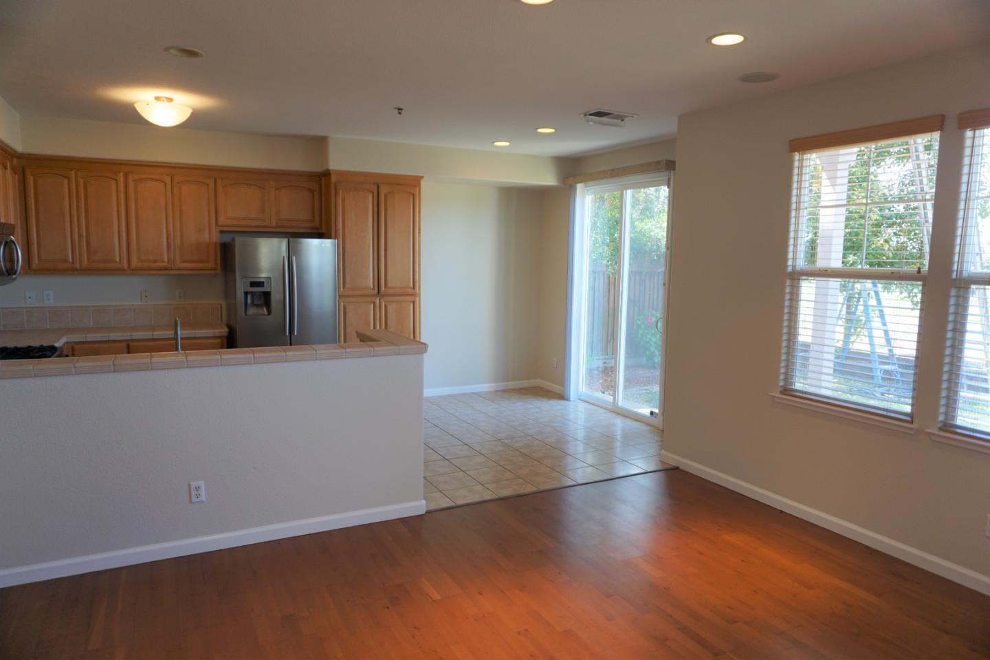 45 Pelican Drive Watsonville, CA 95076 - Photo 8 of 21 a kitchen with stainless steel appliances granite countertop a refrigerator and a microwave