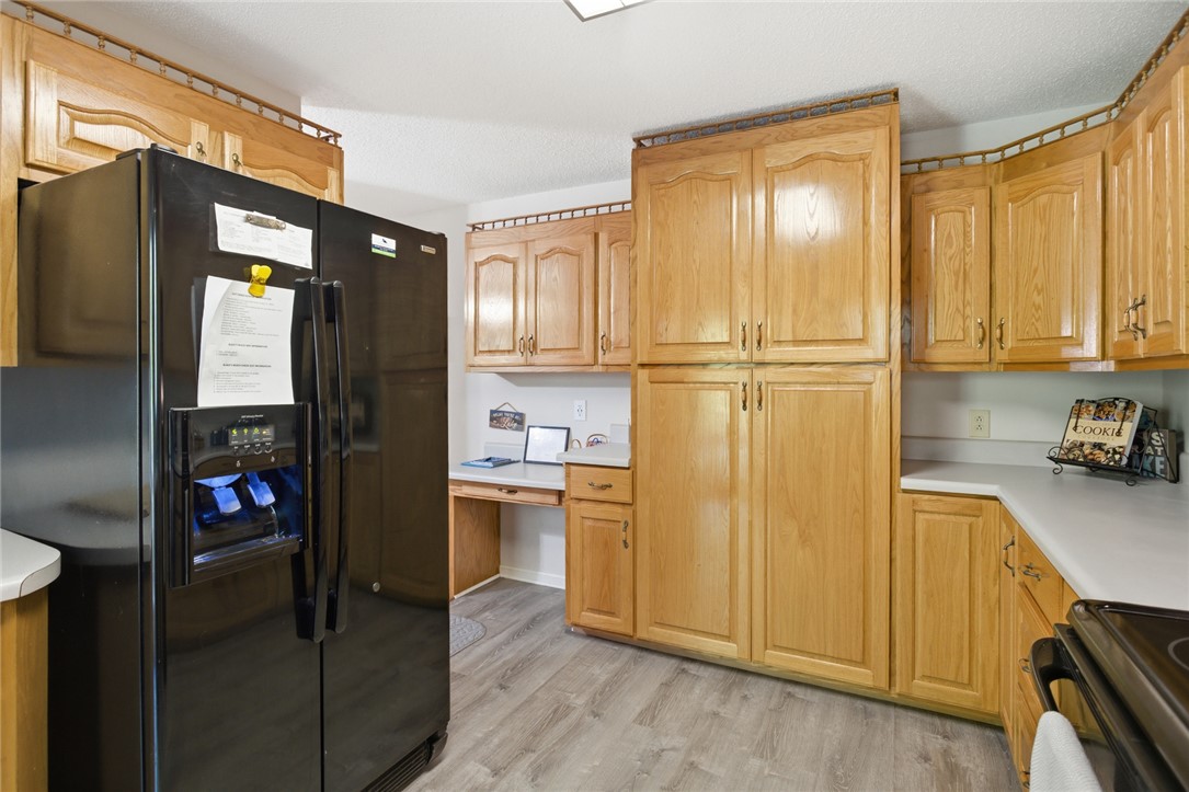 110 Snug Harbor Road Seneca, SC 29678 - Photo 10 of 37 This spacious kitchen features ample cabinetry and integrated workspace, perfect for culinary endeavors and daily tasks.