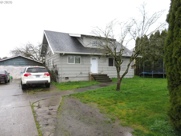 a house view with a garden space