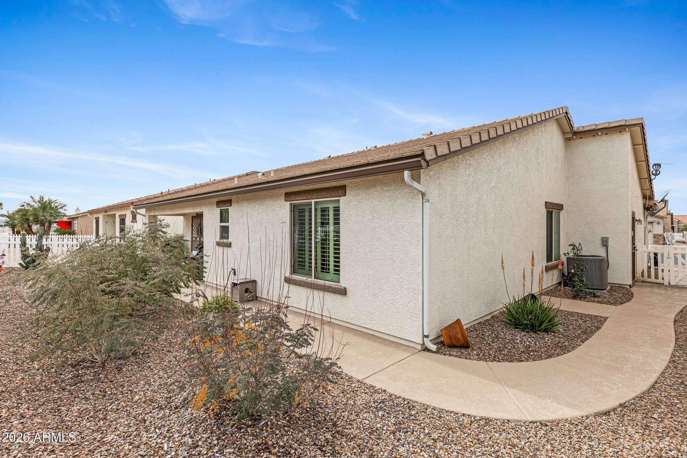 2101 South Meridian Road, Unit 199 Apache Junction, AZ 85120 - Photo 24 of 26 a view of a house with backyard