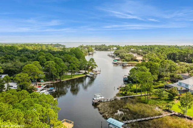 a view of a lake with a houses