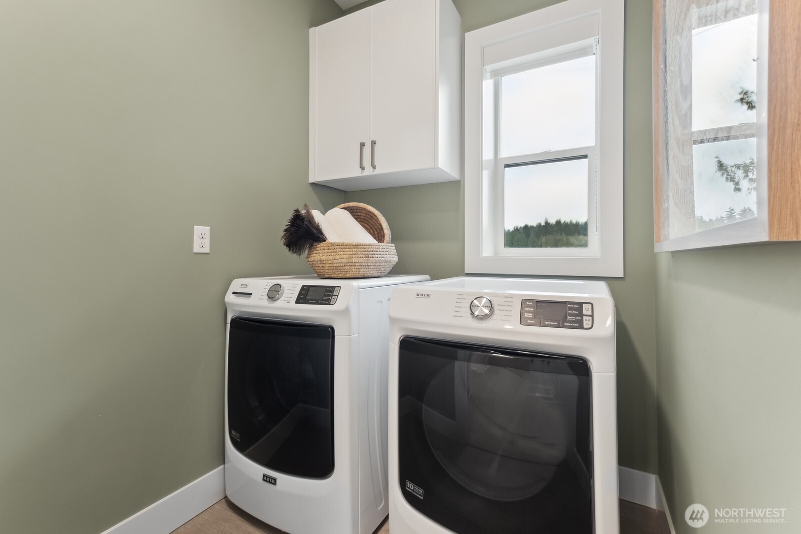 18923 99th Place Northeast, Unit A Bothell, WA 98011 - Photo 23 of 27 a close up view of a washer and dryer