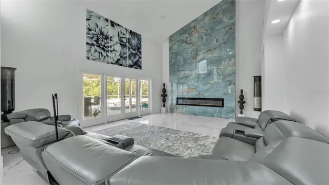 a spacious bathroom with a bathtub sink and mirror