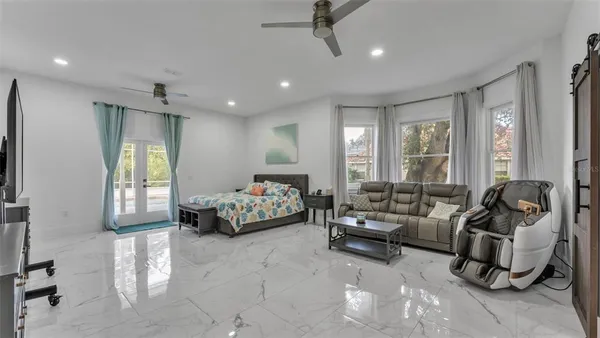 a living room with furniture and a rug
