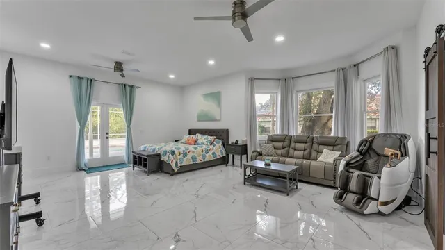 a living room with furniture and a rug