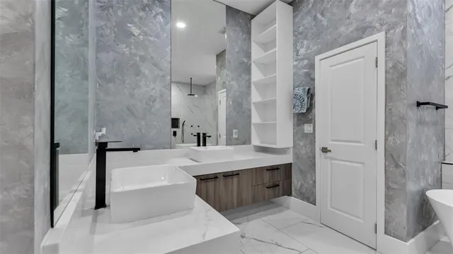 a bedroom with bed and wooden floor